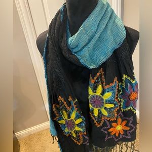 This scarf is so beautiful and transitional. You can wear it multiple ways.